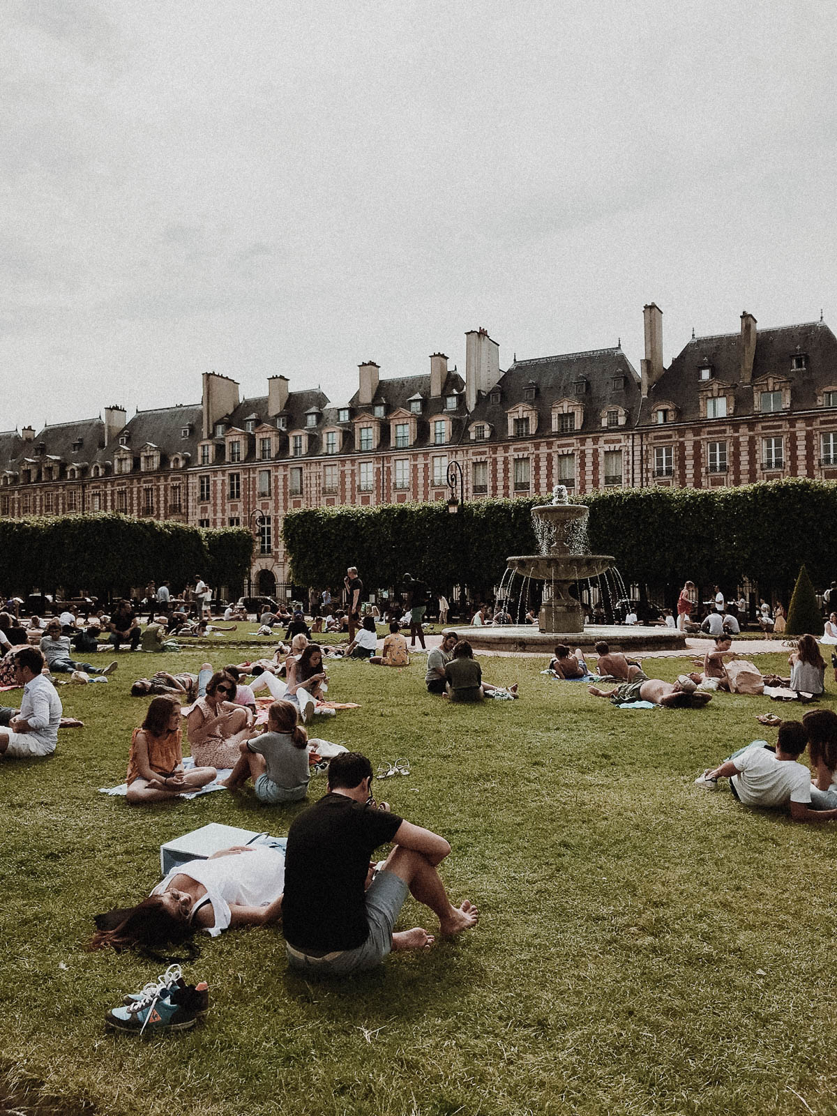 Paris France Travel Guide - Sunbathing in Park, European Architecture and Buildings / RG Daily Blog