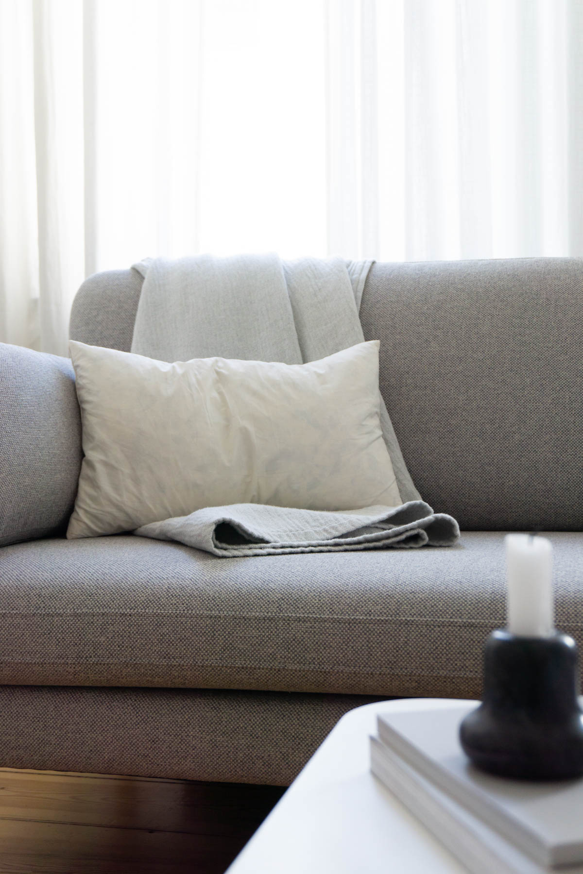 Grey Sofa, Minimalist Living Room, Scandinavian Home - Berlin Flat Rebecca Goddard - RG Daily Blog