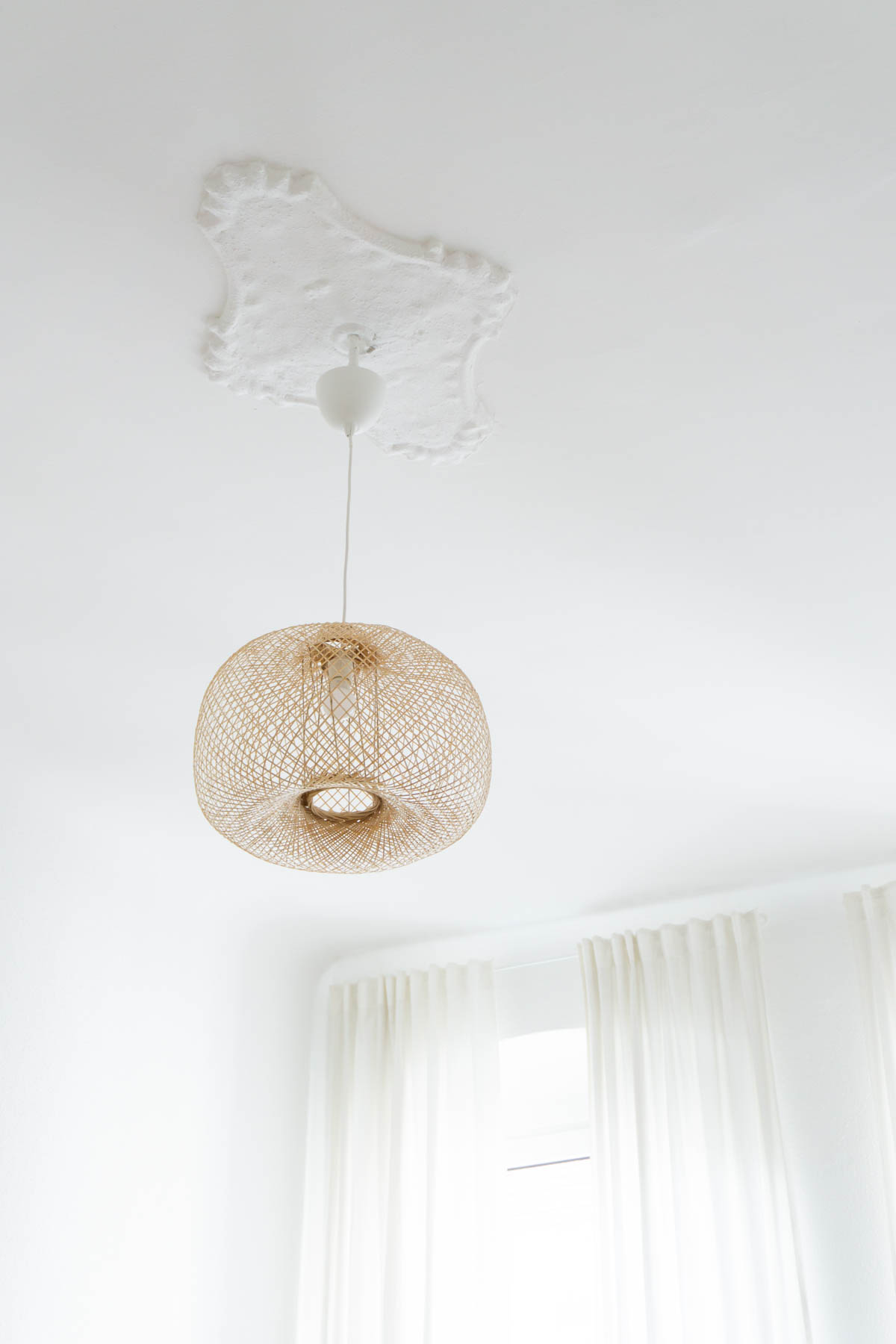 White Living Room, Bloomingville Round Bamboo Lamp, Minimalist Living Room, Scandinavian Home - Berlin Flat Rebecca Goddard - RG Daily Blog