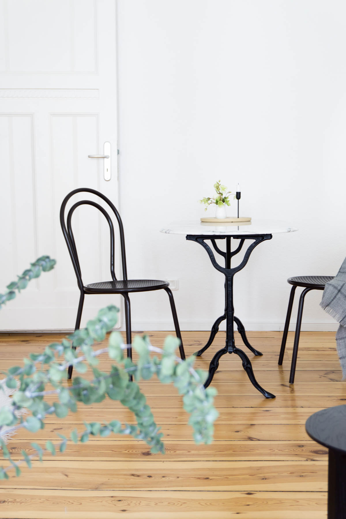 Black Thonet Chairs Marble Table Dinning Area, Minimalist Living Room, Scandinavian Home - Berlin Flat Rebecca Goddard - RG Daily Blog