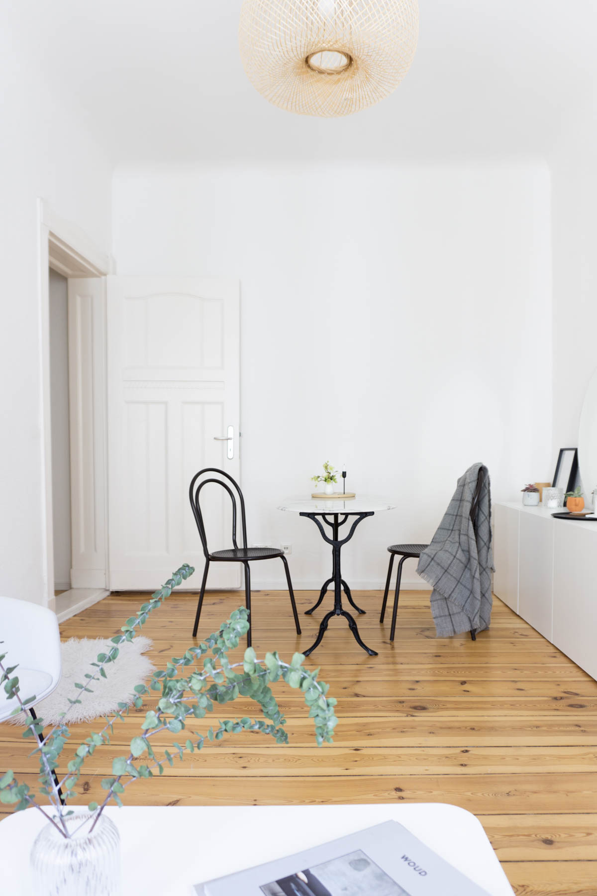 Black Thonet Chairs Marble Table Dinning Area, Minimalist Living Room, Scandinavian Home - Berlin Flat Rebecca Goddard - RG Daily Blog