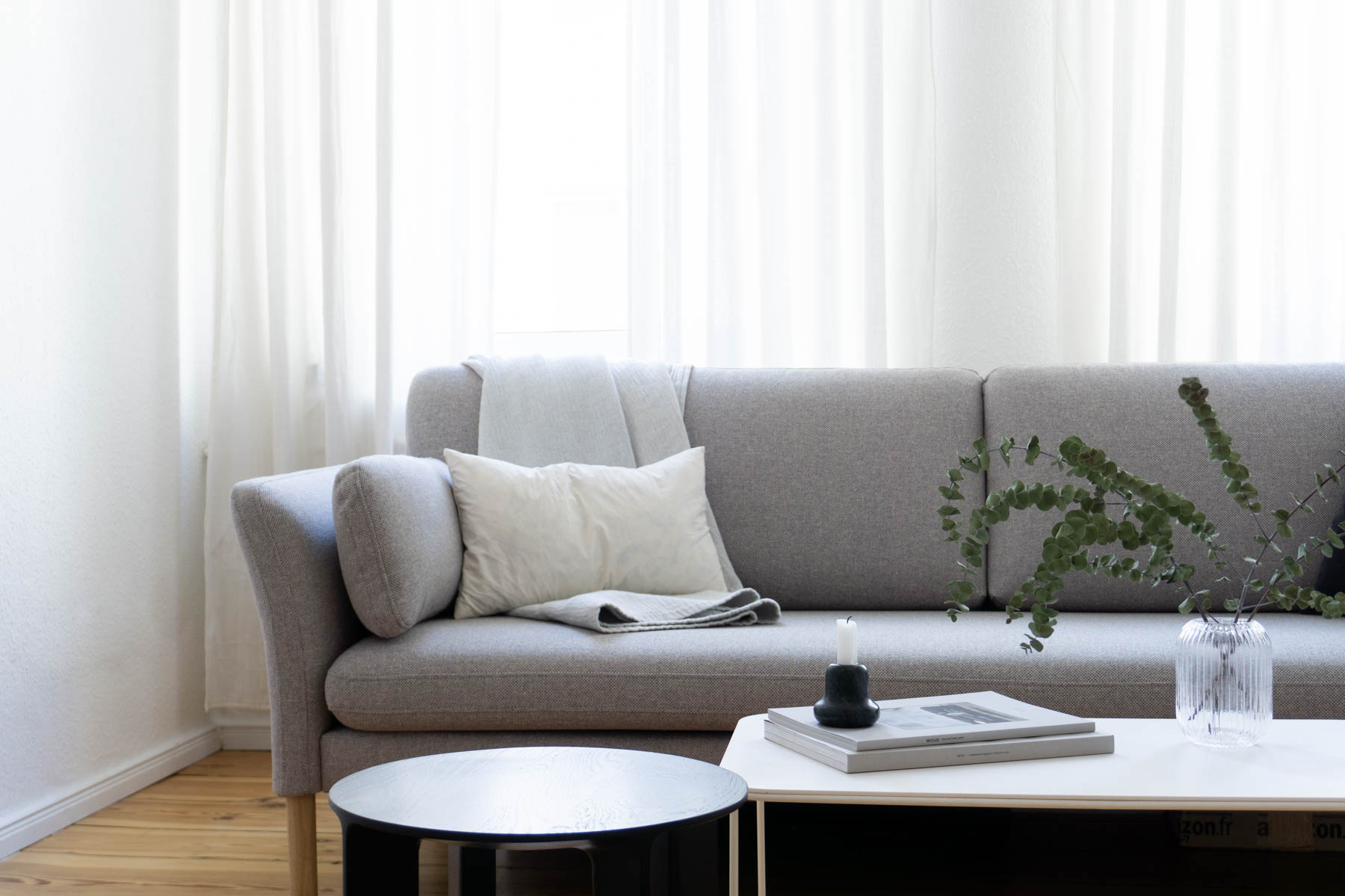 Eucalyptu and Grey Sofa, Minimalist Living Room, Scandinavian Home - Berlin Flat Rebecca Goddard - RG Daily Blog