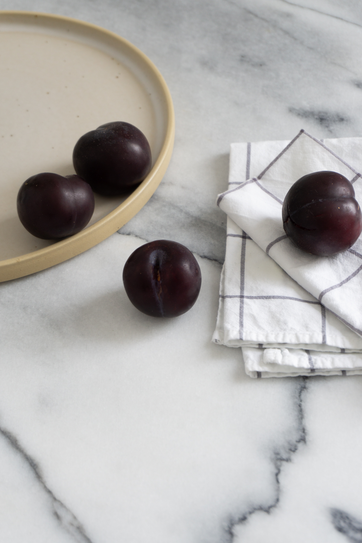 White and Beige Danish Inspired Kitchen | Alva Concept Ceramics, Plums, Marble Kitchen Table - RG Daily Blog, Interior Design