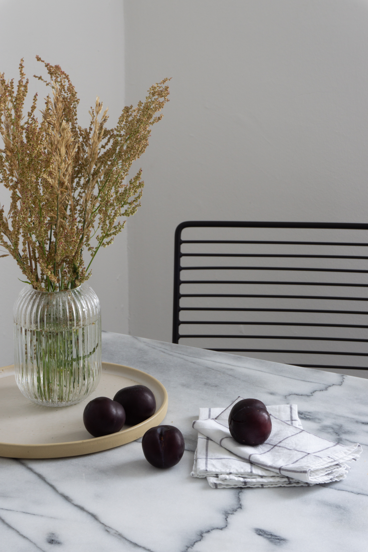 White and Beige Danish Inspired Kitchen | Alva Concept Ceramics, Plums, Marble Kitchen Table, Wheat Arrangement - RG Daily Blog, Interior Design