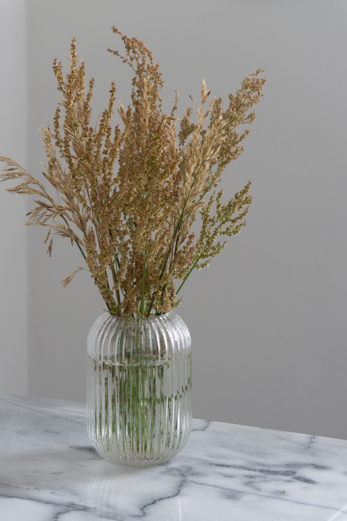 White and Beige Danish Inspired Kitchen | Marble Kitchen Table, Wheat Arrangement - RG Daily Blog, Interior Design