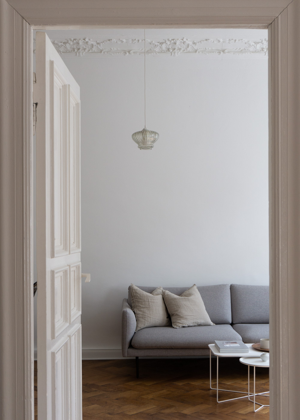 Grey Sofa | neutral interior, white and beige home, wood floors, minimalist simple decor, natural berlin apartment, Scandinavian design, calm aesthetic