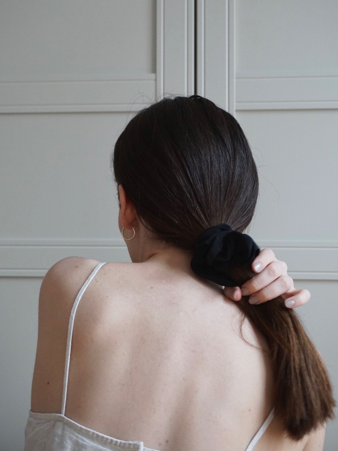 Black scrunchie, long brown hair, minimal style, slow living, fashion, gold hoop earrings, rebecca goddard Bedroom Decor Details, Dried Flowers, beige storage, mirror, Hay Matin Lamp, minimal style neutral home, slow living | RG Daily Blog