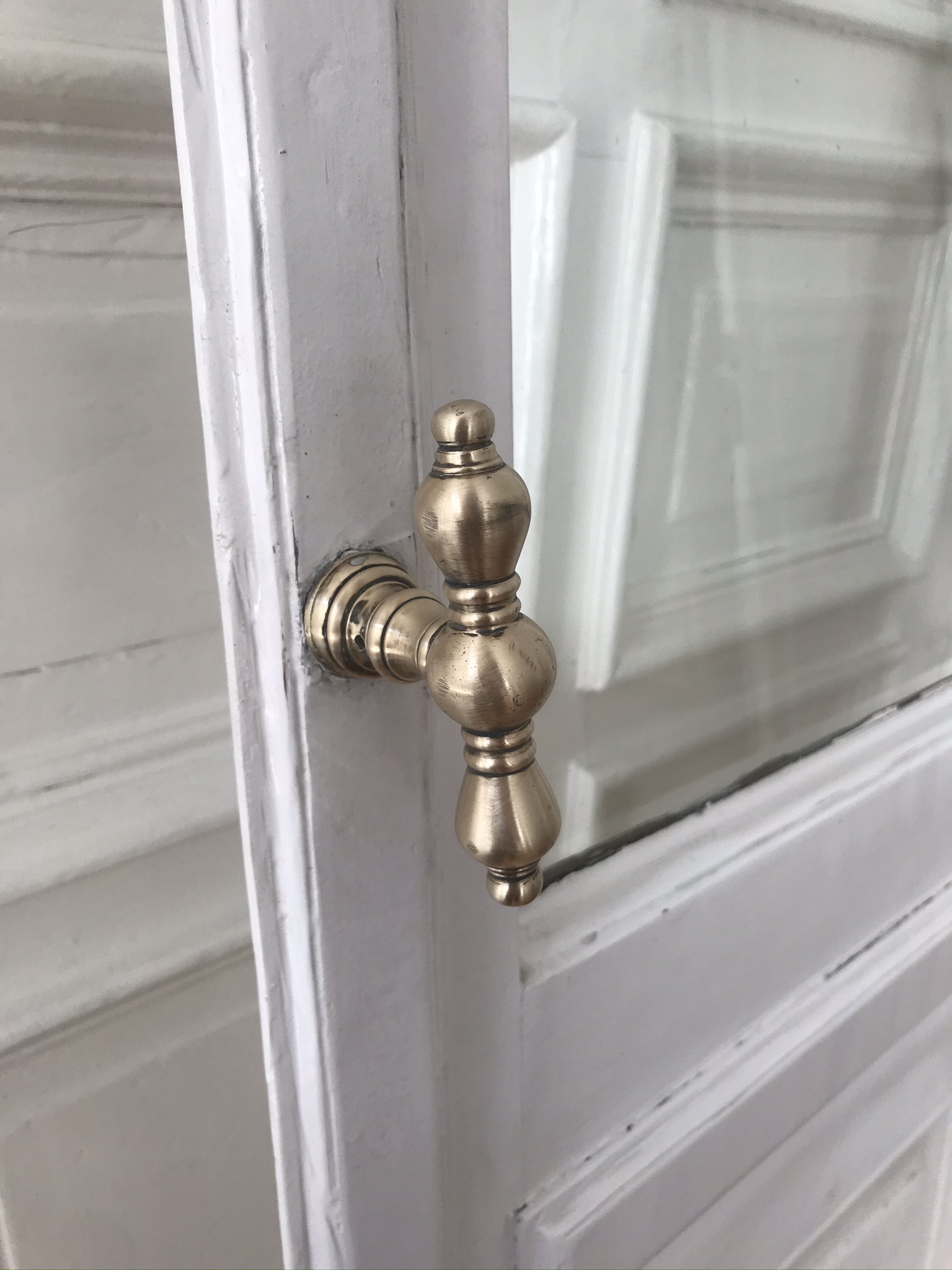 gold-door-handles-white-interior-vintage-design-french-doors-paris ...