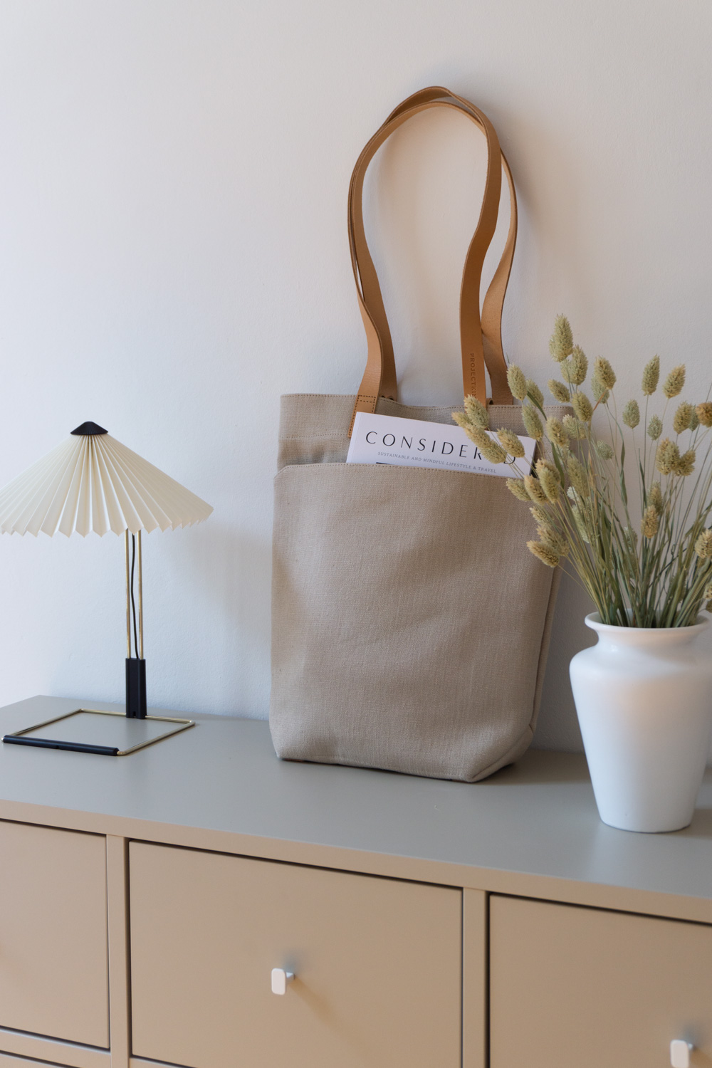 PROJECTKIN Travel Canvas Bag - Sustainable Luggage and travel accessories from eco friendly materials | Danish design, Scandinavian products, mindful accessories, luggage | product photography, shadows, light, minimalist aesthetic | RG Daily Blog