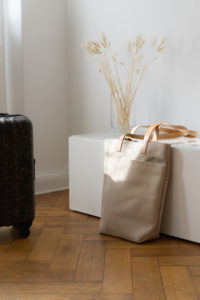 PROJECTKIN Travle Suitcase & Canvas Bag - Sustainable Luggage and travel accessories from eco friendly materials | Danish design, Scandinavian products, mindful accessories, luggage | product photography, shadows, light, minimalist aesthetic | RG Daily Blog