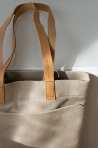 PROJECTKIN Travle Canvas Bag - Sustainable Luggage and travel accessories from eco friendly materials | Danish design, Scandinavian products, mindful accessories, luggage | product photography, shadows, light, minimalist aesthetic | RG Daily Blog