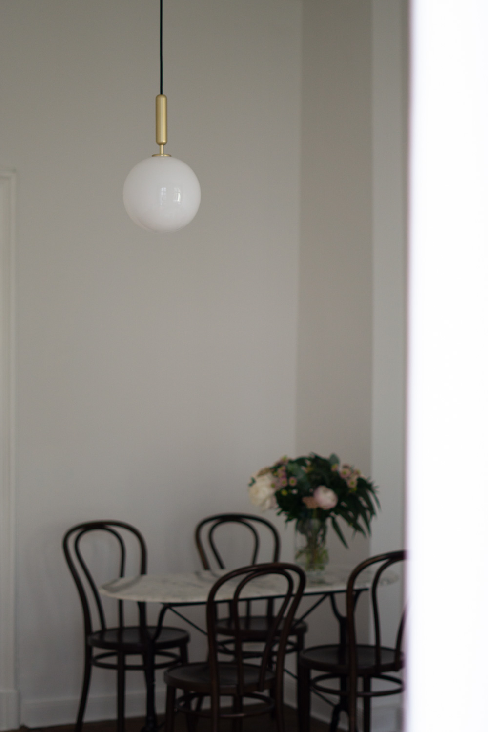 Nuura Lighting, Danish Design, Gold Ball Ceiling Lamp, Wood Floors, White Interior, Miira, Minimalist Home, Classic Interior, Timeless Style, Scandinavian Decor, Neutral Aesthetic