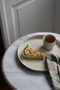 Kleo Co Ceramic Porcelain Rhubarb Tart Minimalist Design Scandinavian Home Product Photography Marble Table Setting Light Shadows Neutral Aesthetic Slow Living